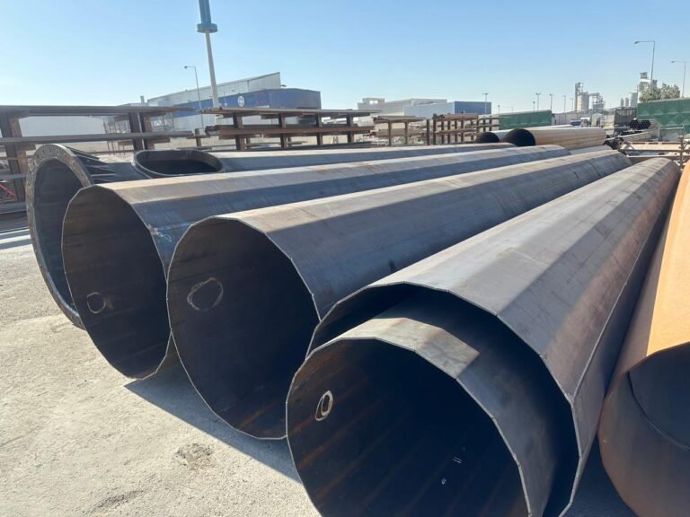 Fabricated polygonal pole shaft sections in a supplied historical photograph.
